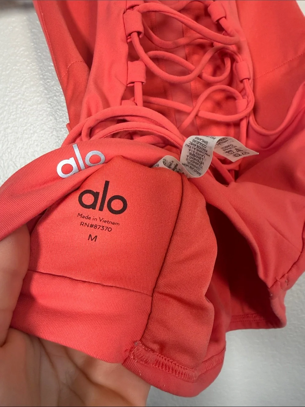 ALO Yoga Lace Up Movement Tank in Coral - M